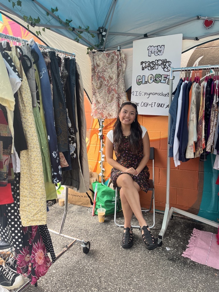Kalissa at her clothing business booth